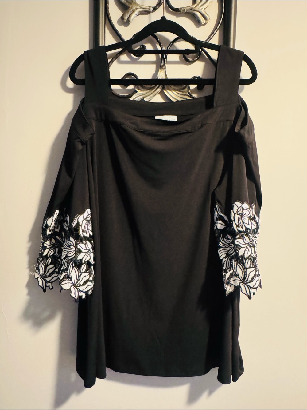 Catherine’s Black Cold-Shoulder Top with White Floral Embroidery